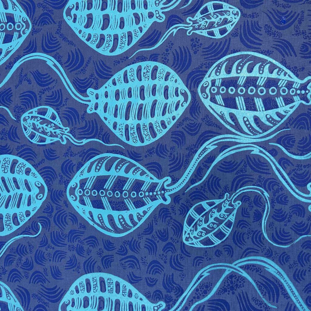 Gracie Kumbi - Stingrays on blue linen (per 1m)