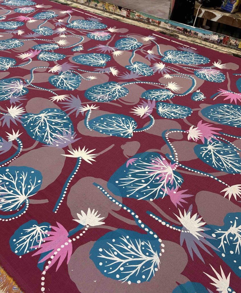 Kieren Karritpul - Water Lilies on deep pink linen (per 1m) - Image 2