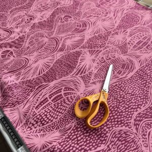 Nola Jimarin - Yams on deep pink linen (per 1m)