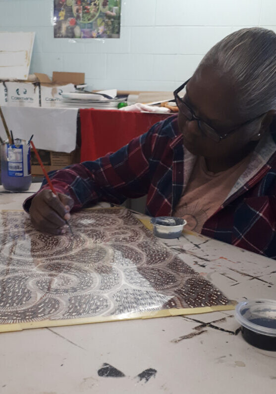 Marita working on a transparency for a print